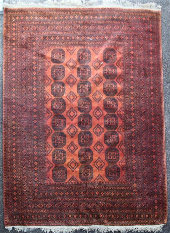 An Afghan Bokhara carpet, 10ft 9in by 8ft 3in.